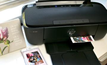 Принтер HP AMP печатает и музыку играет